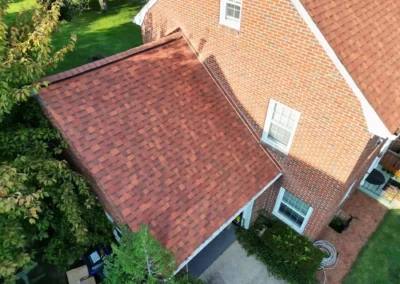 After look of roof replacement with Terra Cotta shingles by Owens Corning