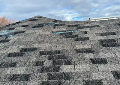 Before look of roof with aging and gutter system