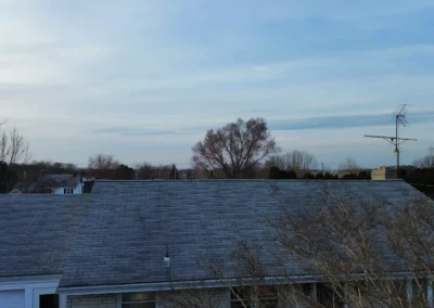 Before look of roof with signs of shingle wear