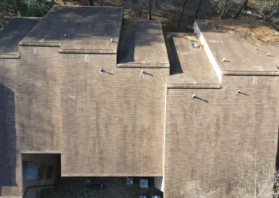 Before look of roof with signs of shingles aging