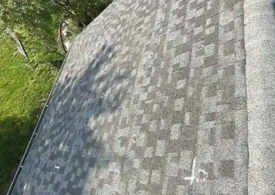 Before look of the project with signs of shingle damage