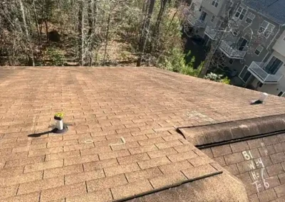 Before look of roof with signs of shingles aging
