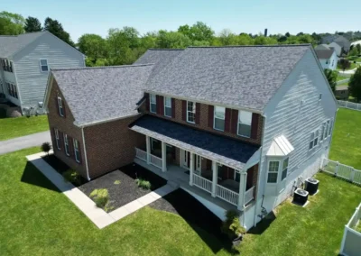 After look of roof project with Owens Corning Duration shingles in Midnight Plum