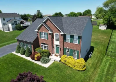 After look of roof with new Owens Corning Duration shingles in Onyx Black