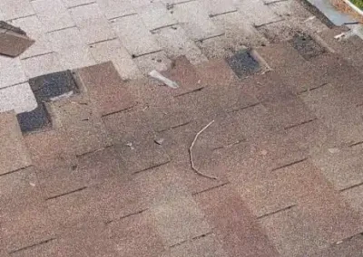 Before look of roof with signs of worn down shingles