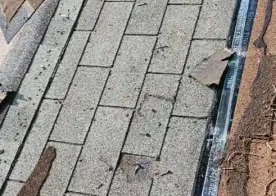 Before look of roof with signs of worn down shingles